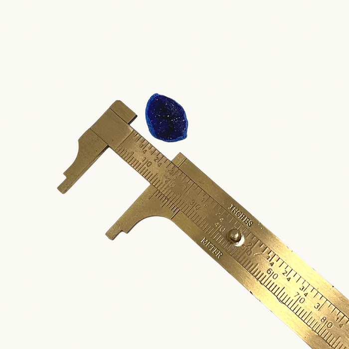 Vibrant blue Azurite crystal, approximately 0.75 inches in size, handpicked for you by Juniper Stones