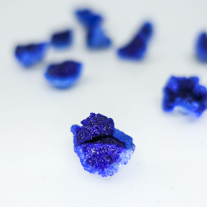 Vibrant blue Azurite crystal, approximately 0.75 inches in size, handpicked for you by Juniper Stones