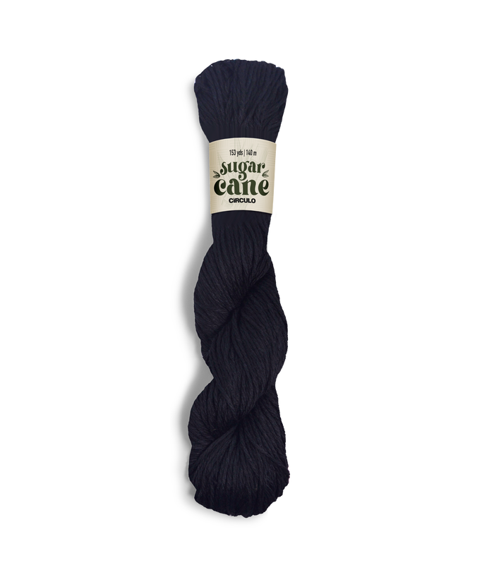 An image of a skein of Circulo DK weight yarn in a solid black color with a ‘Sugar Cane’ label against a white background.
