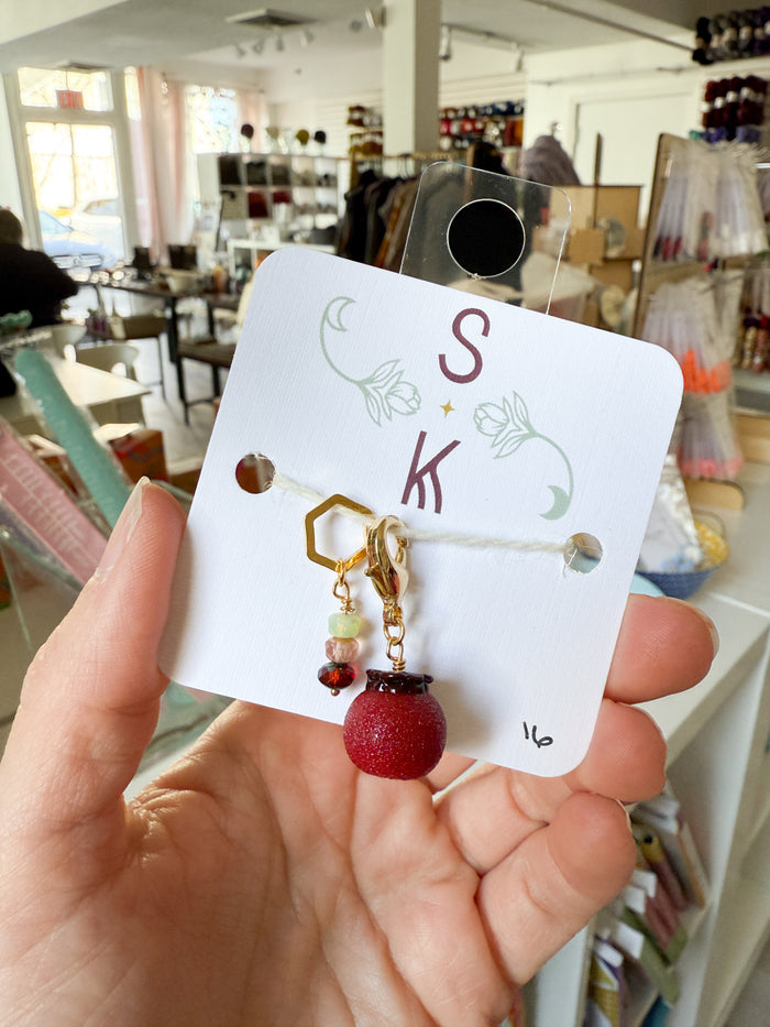 Persephone’s Pomegranate Stitch Markers by Sassafras Knits